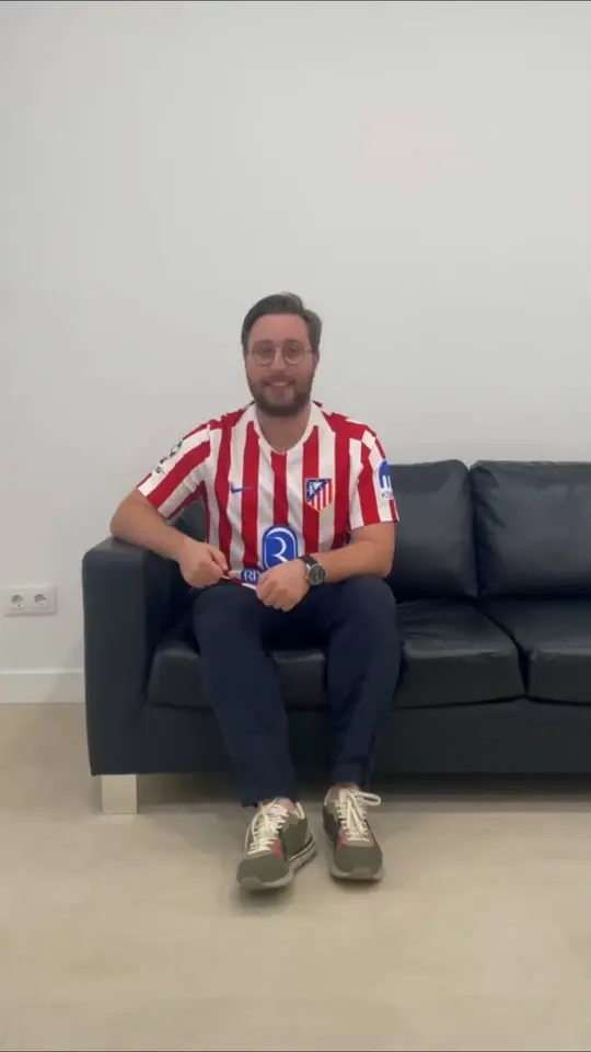 A clinician sitting in the clinic, talking to camera about the training